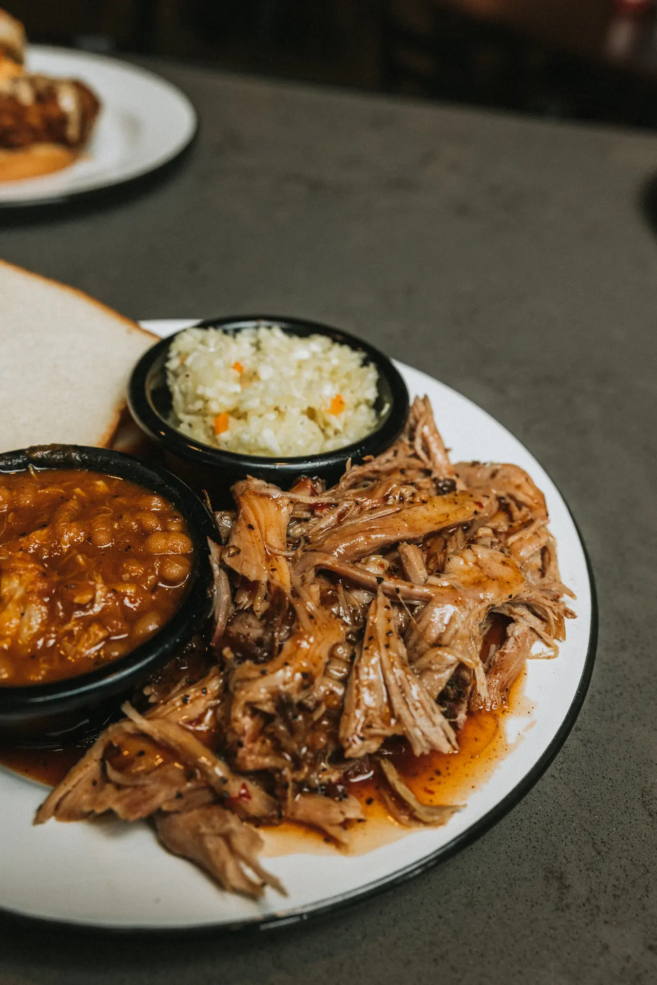 Pulled pork plate with baked beans and coleslaw