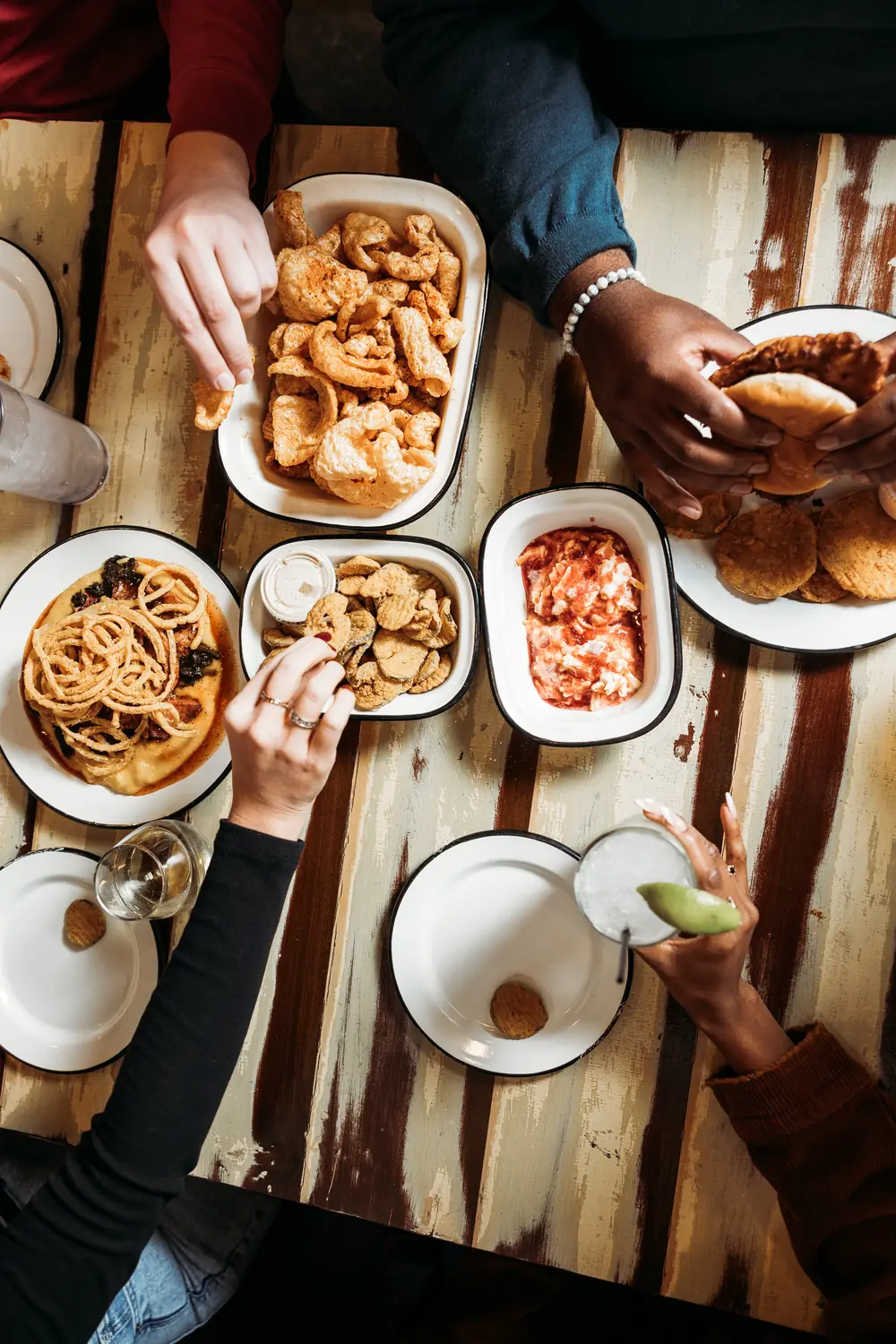 Overhead view of a shared SAW’s BBQ table spread for a group